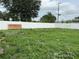 Expansive backyard offering ample space for outdoor activities and potential landscaping projects at 2875 Delrose N Dr, Lakeland, FL 33805