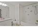 Bright full bathroom with shower-tub combination and tile flooring at 2880 Boyd Ct, Deltona, FL 32738