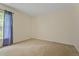 Bright bedroom with neutral carpet and window with privacy blinds at 2880 Boyd Ct, Deltona, FL 32738