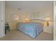 Bedroom with carpeted floor, dresser, and ensuite bathroom access at 2880 Boyd Ct, Deltona, FL 32738