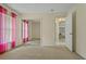 Bedroom featuring a mirrored closet and a doorway to the living room at 2880 Boyd Ct, Deltona, FL 32738