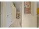 Inviting hallway featuring tile flooring leading to a comfortable living space at 2880 Boyd Ct, Deltona, FL 32738