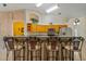 Well-equipped kitchen with wooden cabinetry and a peninsula bar for casual dining at 2880 Boyd Ct, Deltona, FL 32738
