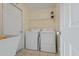 Bright laundry room with washer, dryer, and utility sink at 2880 Boyd Ct, Deltona, FL 32738