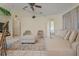 Comfortable living room with tile flooring, decorative accents, and neutral-toned furniture at 2880 Boyd Ct, Deltona, FL 32738
