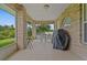 Covered patio with tile floor and dining set at 2880 Boyd Ct, Deltona, FL 32738