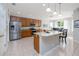 Beautiful kitchen with stainless steel appliances, granite countertops, and a functional center island at 307 Ravenshill Way, Deland, FL 32724
