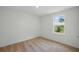 Bedroom with carpet flooring and a window that provides great natural light at 3121 Canterbury St, Deltona, FL 32738