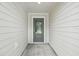 Front door with decorative glass detail and sidelights leading into the home at 3121 Canterbury St, Deltona, FL 32738