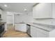 Well-lit kitchen boasting granite countertops and ample cabinet space at 3121 Canterbury St, Deltona, FL 32738