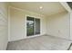 Covered patio with concrete flooring perfect for outdoor dining and relaxing at 3121 Canterbury St, Deltona, FL 32738