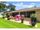 Spacious backyard with a screen enclosure, lush lawn, and plenty of room for outdoor entertaining at 3132 Mango Tree Dr, Edgewater, FL 32141