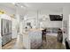 Modern kitchen with stainless steel appliances, stone accents, and an open layout at 3132 Mango Tree Dr, Edgewater, FL 32141