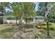 A lovely home with a well-maintained backyard, perfect for outdoor activities and relaxation at 319 N Salisbury Ave, Deland, FL 32720