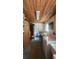 Functional laundry room with washer, dryer, and wood paneled ceiling at 319 N Salisbury Ave, Deland, FL 32720