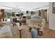Spacious living area seamlessly connects to the kitchen, dining area, and outdoor patio at 319 N Salisbury Ave, Deland, FL 32720