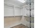 Well-organized walk-in closet with shelving and custom storage solutions, providing ample space at 33 Coquina Ridge Way, Ormond Beach, FL 32174