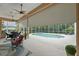 Screened pool with an attached covered patio and backyard at 33 Coquina Ridge Way, Ormond Beach, FL 32174