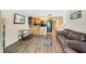 Comfortable living room and well-equipped kitchen create a seamless living space at 3647 S Atlantic Ave # 7C, Daytona Beach, FL 32118