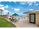 Relaxing pool area featuring ocean views and poolside lounging at 3647 S Atlantic Ave # 7C, Daytona Beach, FL 32118