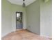 Inviting entryway with a decorative door and warm, welcoming ambiance at 3671 Plantation Dr, Ormond Beach, FL 32174