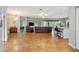 Open-concept living room with tiled floors, a ceiling fan, and stylish furnishings at 3671 Plantation Dr, Ormond Beach, FL 32174