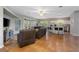 Spacious living room open to the kitchen and dining area with lots of natural light at 3671 Plantation Dr, Ormond Beach, FL 32174