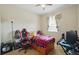 Bedroom with natural light, fan, and desk at 3839 Calliope Ave, Port Orange, FL 32129