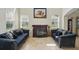 Cozy sitting area with stylish sofas and natural light from the windows at 3839 Calliope Ave, Port Orange, FL 32129
