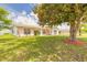 Spacious home with green lawn and inviting curb appeal at 4 Brandy Hills Dr, Port Orange, FL 32129