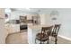 Lovely kitchen featuring stainless steel appliances, granite counters, and an island with seating for two at 4 Brandy Hills Dr, Port Orange, FL 32129