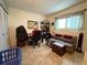 Versatile space with tile flooring, bright natural light, suitable for bedroom or use as functional office at 411 N Halifax Ave # 208, Daytona Beach, FL 32118