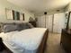 Serene bedroom featuring tile flooring and ample closet space at 411 N Halifax Ave # 208, Daytona Beach, FL 32118