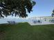 Relaxing waterfront park featuring picnic tables, benches, lush lawns and a beautiful bridge view at 411 N Halifax Ave # 208, Daytona Beach, FL 32118