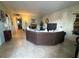 Expansive living room with tile flooring and comfortable furniture at 411 N Halifax Ave # 208, Daytona Beach, FL 32118