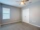 Bedroom featuring carpet flooring, natural light from the window and a ceiling fan at 422 Armoyan Way, New Smyrna Beach, FL 32168