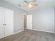 Bedroom featuring carpet flooring, with ceiling fan and closet for storage at 422 Armoyan Way, New Smyrna Beach, FL 32168