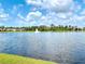 Picturesque lake view with a fountain, adding a touch of elegance to the community at 422 Armoyan Way, New Smyrna Beach, FL 32168