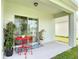 Covered patio with outdoor seating, sliding glass doors at 422 Armoyan Way, New Smyrna Beach, FL 32168