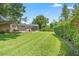 A spacious backyard offers plenty of room for activities and features a well-maintained lawn at 43350 Natchez St, Deland, FL 32720