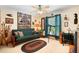 Well-lit bedroom featuring a futon, telescope, and cozy decor, creating a versatile space at 43350 Natchez St, Deland, FL 32720