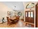 Elegant dining room with a large wooden table, comfortable seating, and ample space for entertaining guests at 43350 Natchez St, Deland, FL 32720