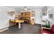 Functional home office provides a quiet workspace with a built-in desk, natural light, and ample storage at 43350 Natchez St, Deland, FL 32720