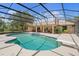 Screened-in pool features an attached spa and plenty of room for entertaining at 43350 Natchez St, Deland, FL 32720