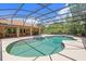 This screened-in pool features an attached spa and easy access to the backyard at 43350 Natchez St, Deland, FL 32720