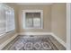 Bright bonus room offers natural light, tile floors, and a neutral color palette at 441 N Julia Ave, Deland, FL 32720