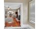 Bright living room features an open concept design with access to the dining room and kitchen at 441 N Julia Ave, Deland, FL 32720