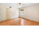 Bedroom with laminate floors, closet and ceiling fan with lighting at 507 Sand Ave, Apopka, FL 32703