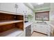 Functional kitchen with bright cabinets, an oven, and lots of counter space at 507 Sand Ave, Apopka, FL 32703