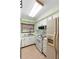 Functional kitchen with bright cabinets, an oven, and lots of counter space at 507 Sand Ave, Apopka, FL 32703